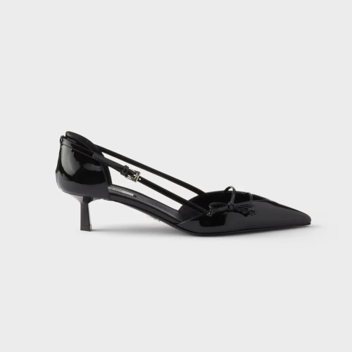 Open side patent leather pumps