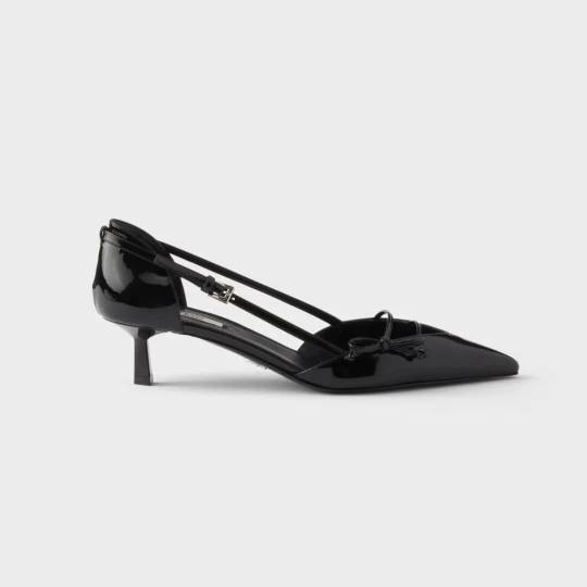 Open side patent leather pumps